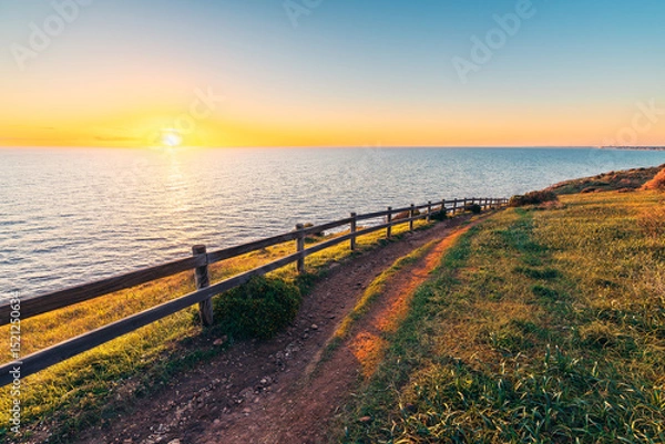 Fototapeta Hallett Cove Conservation Park Coastal trail with ocean views at sunset, South Australia