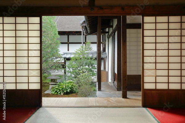 Obraz Interior of a traditional japanese house with sliding doors and view on a japanese garden
