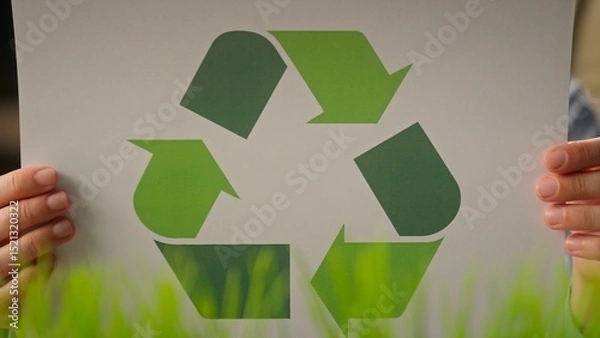 Fototapeta Recyclable symbol holding unrecognizable businesswoman girl woman in office eco-friendly business circle sorting paper protect ecology recycling saving nature reuse zero waste green energy bio recycle