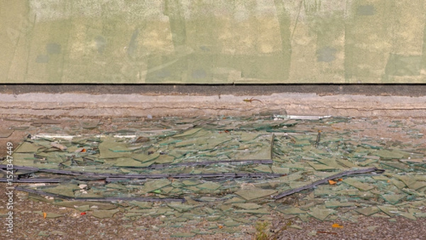 Fototapeta Broken Double Paned Windows Glass Shards Sharp Pieces Danger at Floor