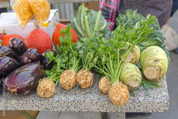 Fototapeta Celeriac Celery Root Turnip Aubergine Vegetables for Sale at Farmers Market Stall