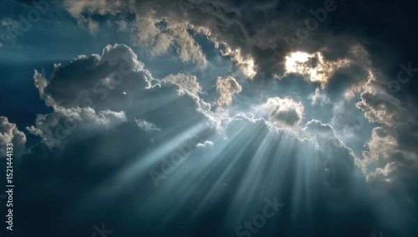 Fototapeta Golden hour sunlight breaking through clouds with ethereal god rays, serene natural backdrop for spiritual branding, wellness websites, and inspirational print designs.
