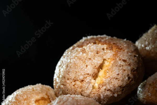 Obraz Cookies In Plates On A Black Background
