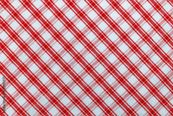 Fototapeta Checkered red fabric. Textile. Checkered fabric background with red and white cells