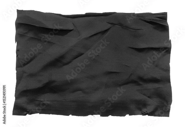 Fototapeta A piece of torn black fabric on a white background. Textile isolate