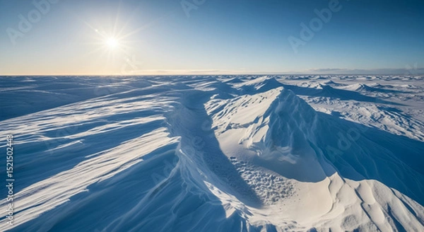 Fototapeta Majestic Snowscape Under a Radiant Sun in the Arctic Wilderness