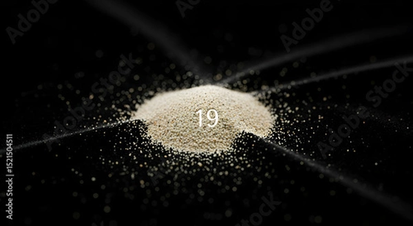 Obraz Heap Of Powder On Black Surface With Number Nineteen Overlay