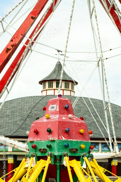 Obraz  An Abandoned Amusement Park Ride in front of a Gazebo