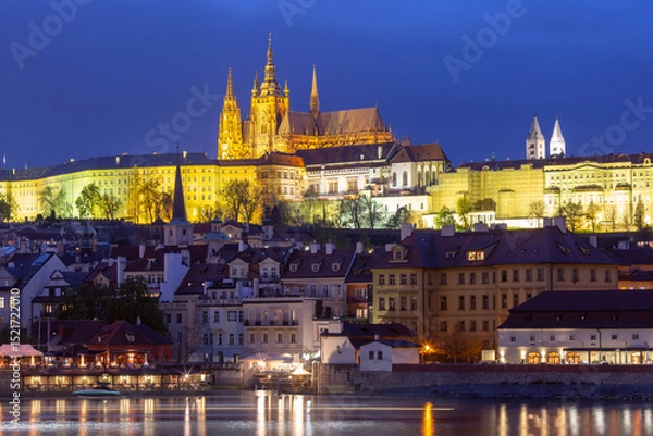 Fototapeta Prague Hradcany and St Vitus Cathedral illuminated at dawn in Prague, Czech Republic