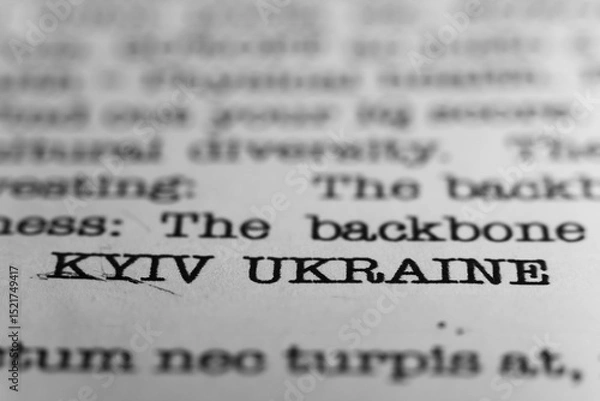 Fototapeta Kyiv, Ukraine. Text printed on a page. A piece of paper with a phrase written in retro typewriter font. Capital city