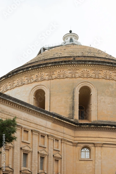 Fototapeta Facade and Dome of Basilica of the Assumption of Our Lady,  commonly known as the Rotunda of Mosta, in Malta.