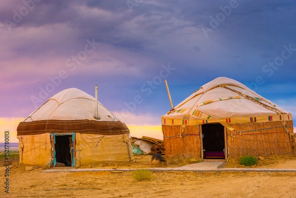Obraz Nomadic Yurt tent camp in the desert of the Aral Lake at sunset,  Uzbekistan