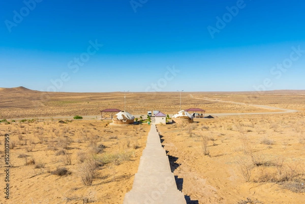 Obraz Kyzylkum (red sand) Desert of the Khorezm region from Chilpik Kala,  Uzbekistan