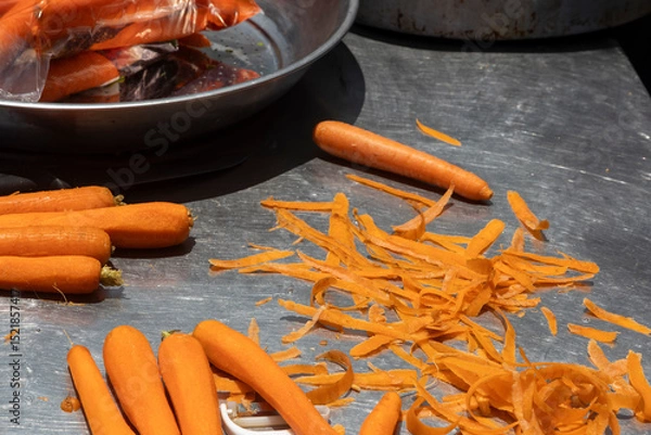 Fototapeta Preparing Fresh Carrots is on the iron table