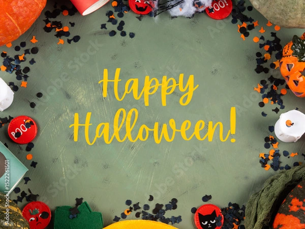 Fototapeta Happy halloween green frame background flatlay with pumpkins and decor