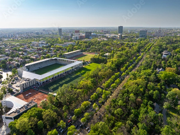 Fototapeta King Michael I Park (former Herastrau Park) in Bucharest. Aerial photo with the biggest park in Bucharest. Green forest lake landscape in Bucharest, Romania, during a summer beautiful day.