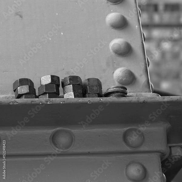 Fototapeta Nuts and bolds in an abstract black and white image