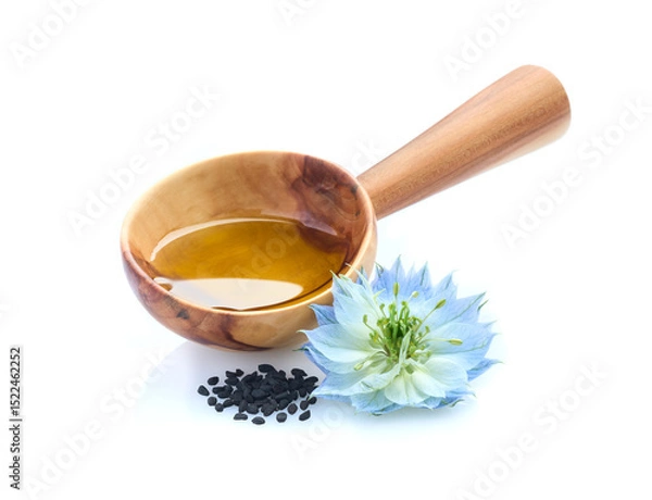 Fototapeta Black cumin seeds and oil with nigella sativa flower on white background