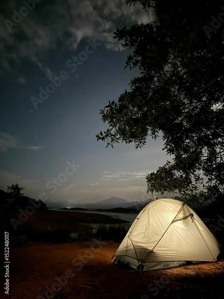 Obraz Night camping with tent under starry sky.