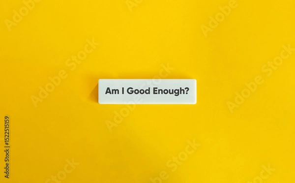 Fototapeta Am I Good Enough Letter Tile on Yellow Background – Minimalist Self-Doubt and Mental Health Concept
