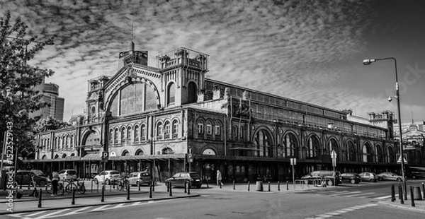 Obraz Warsaw, Poland - 05 13 2024: Black and white image of the Hala Mirowska market building.