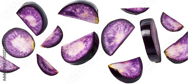 Obraz Sliced vibrant purple root vegetables scattered on black background
