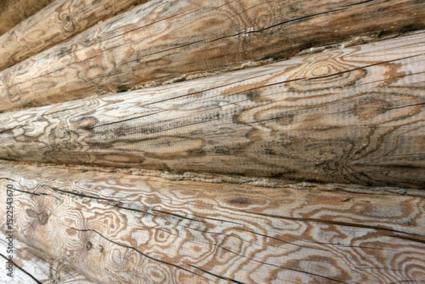 Obraz Rustic wooden logs with distinct patterns and textures