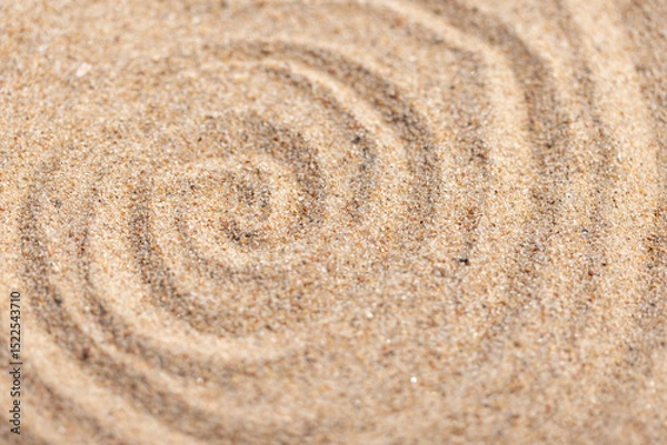 Obraz Close-up view of fine sand forming spiral shapes, abstract photo