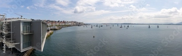 Obraz Part of the Botín Center, Pereda Promenade, with its incredible atmosphere, the Bay of Santander, and sailboats. Santander, Spain
