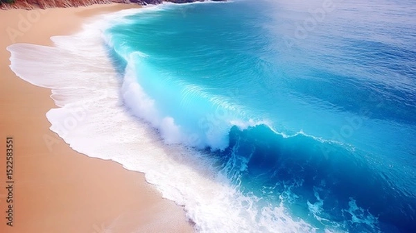 Obraz A large ocean wave cresting near a sandy beach shoreline