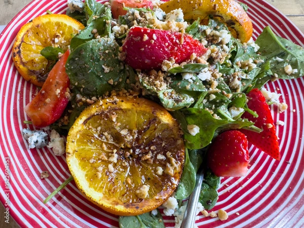 Obraz Greek-style spinach salad with grilled oranges and blue cheese