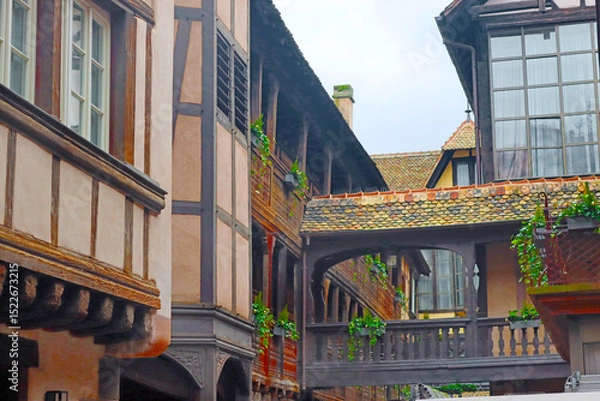 Fototapeta Balcony on inner yard with traditional half-timbered house, Strasbourg, France