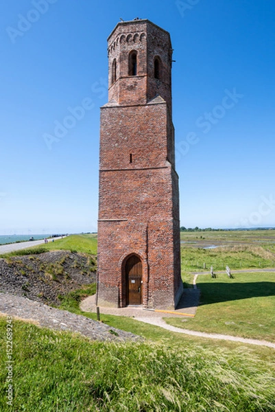Obraz The Plompe Toren (clumsy tower), located near Burghsluis, Netherlands, is the sole reminder of the flooded village Koudekerke.