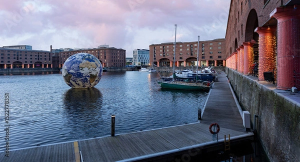 Fototapeta Liverpool, united kingdom May, 16, 2023  Floating earth in Albert Dock for Eurovision 2023