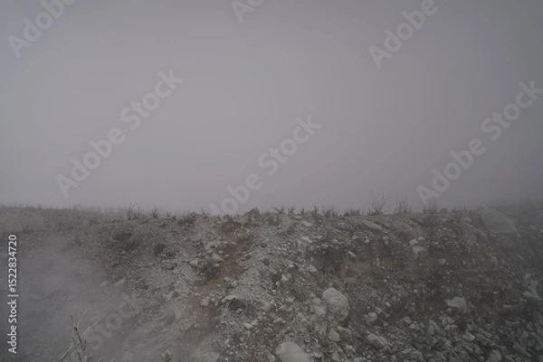 Fototapeta misty cloud on a top of mountain