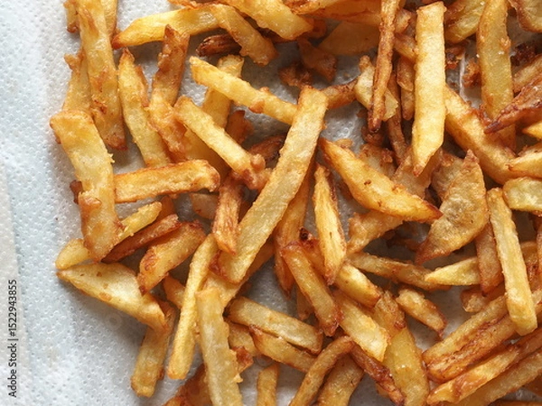 Fototapeta top view French fries on paper towel