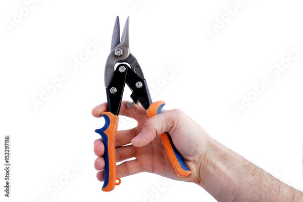 Fototapeta man hand, bare, holding tin snips, isolated over white background