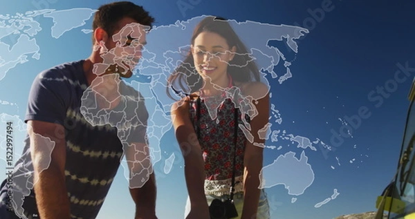 Fototapeta Image of world map over caucasian couple talking