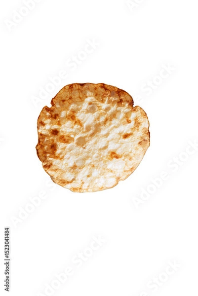 Fototapeta Crispy Rice Cake Delight on a Black Backdrop - A Light and Healthy Snack