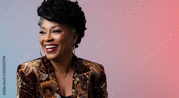 Obraz Portrait of joyful senior Black woman in colorful jacket on gradient background, smiling confidently