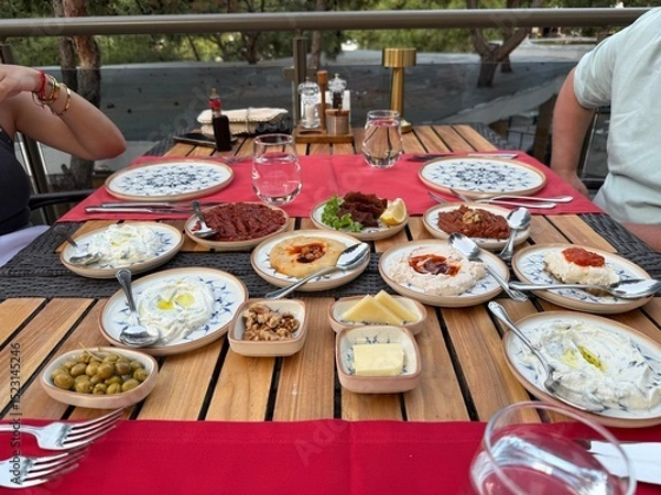 Fototapeta Turkish raki table with appetizer ready to eat