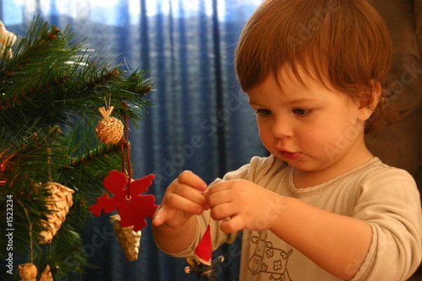 Obraz child and christmas tree