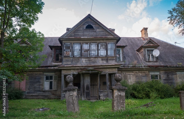 Obraz Deteriorated abandoned haunted old house. Dobele, Latvia
