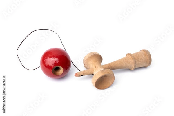 Fototapeta Vintage Old toys that have been played with there are traces damage of play. Cup and ball game Kendama traditional wooden japanese skill toy isolated on white background.