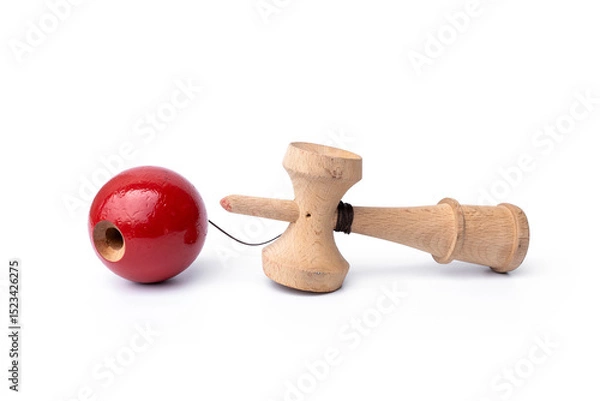 Fototapeta Vintage Old toys that have been played with there are traces damage of play. Cup and ball game Kendama traditional wooden japanese skill toy isolated on white background.