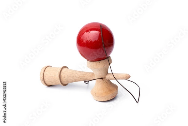 Fototapeta Vintage Old toys that have been played with there are traces damage of play. Cup and ball game Kendama traditional wooden japanese skill toy isolated on white background.