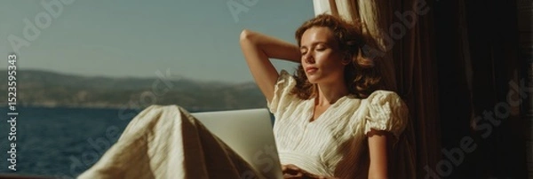 Fototapeta Luxury remote work lifestyle on yacht deck with ocean view, moody natural light, rich emerald tones, promoting professional flexibility and travel workation