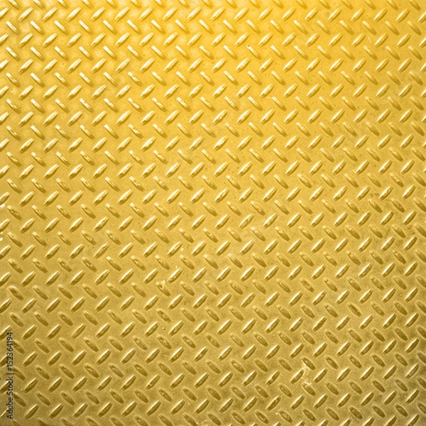 Obraz Shiny and bright, golden colored heavy diamond steel plate, useful as a background.