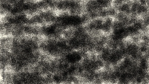 Fototapeta Grainy black and white noise texture with retro stipple effect. Perfect for backgrounds, vintage print design, or abstract overlays in digital art.