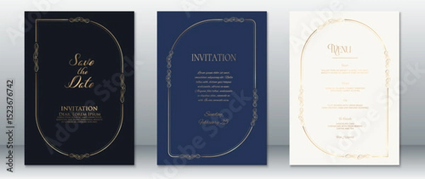 Fototapeta Stylish wedding invitation suite featuring deep navy blue and royal blue tones with gold decorative frames, complemented by an elegant cream menu card.